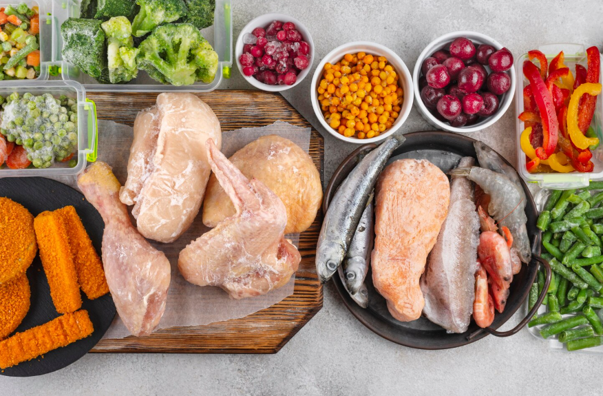 frozen foods arranged to illustrate freezer meal planning for beginners with practical ingredients