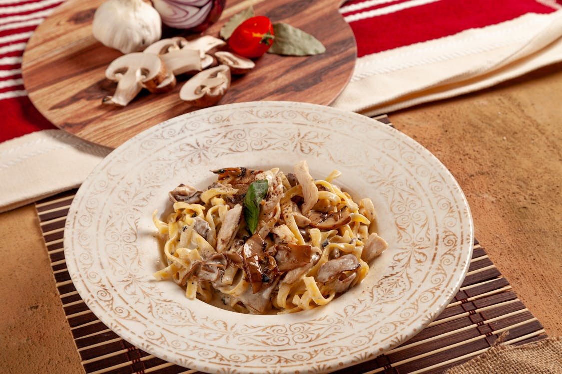 creamy mushroom pasta illustrating budget meals that taste expensive with affordable ingredients